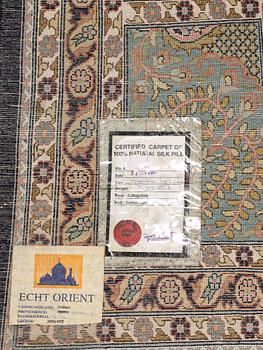 A silk carpet, Kashmir, c. 402 x 300 cm.