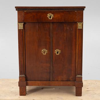 An Empire cabinet, first half of the 20th Century.