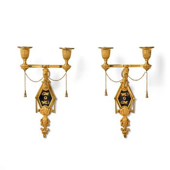 159. A pair of two-branch late Louis XVI ormolu and blued steel appliques attr. to F. Rémond (bronzier in Paris 1774-1812).