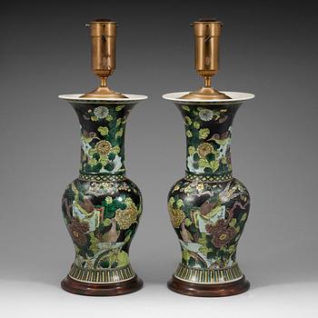 A pair of famille noir vases mounted as lamps, Qing dynasty, 19th Century.