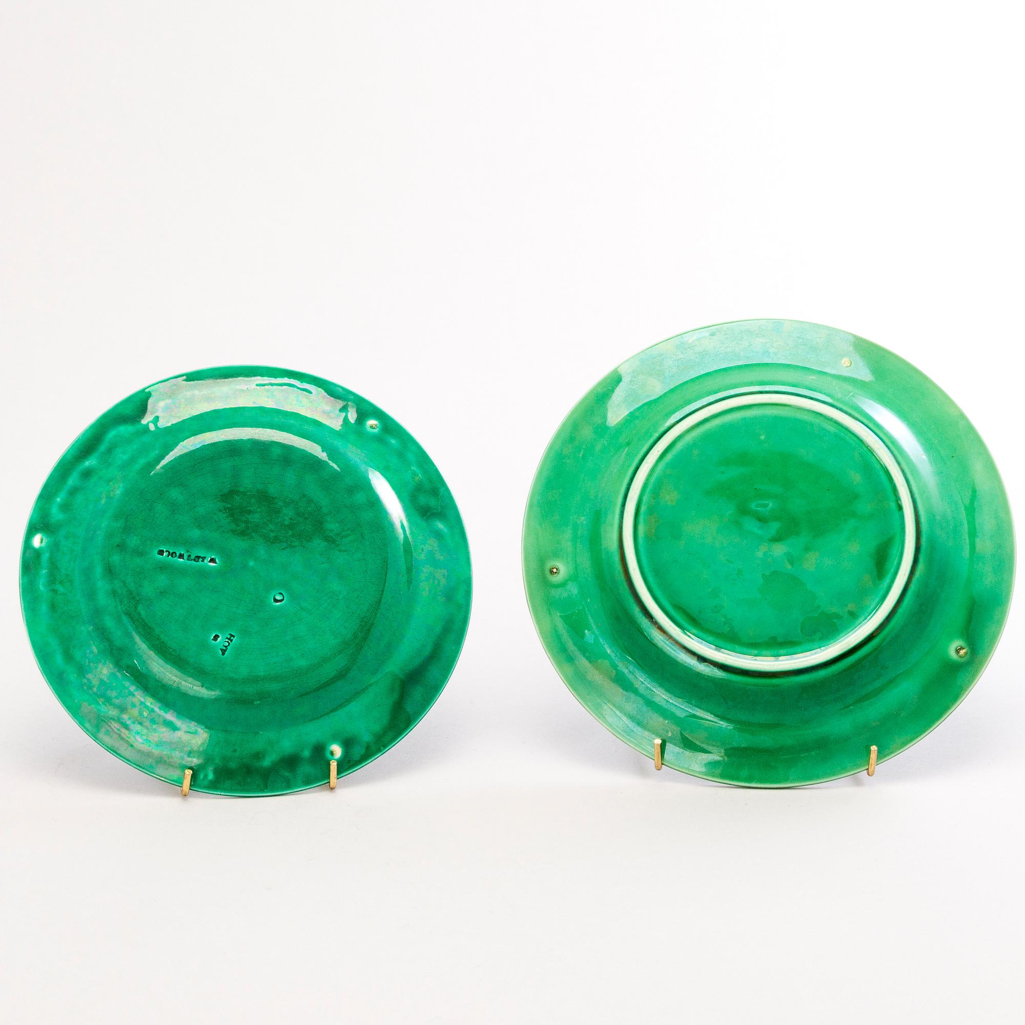 A set of three majolika Wedgwood leaf plates and two similar plates.