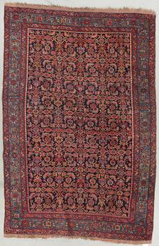 A semi-antique west persian around 212 x 143 cm.