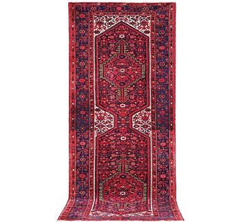 A Hosseinabad runner carpet, c. 391 x 135 cm.