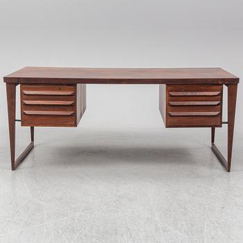 A 1960's rosewood desk by Kai Kristiansen, Feldballes Møbelfabrik, Denmark.