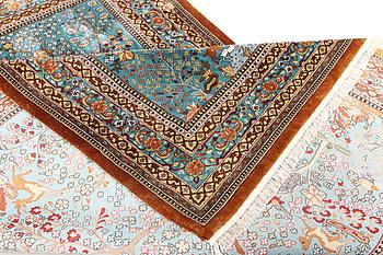An all silk oriental carpet, a. 280 x 185 cm.