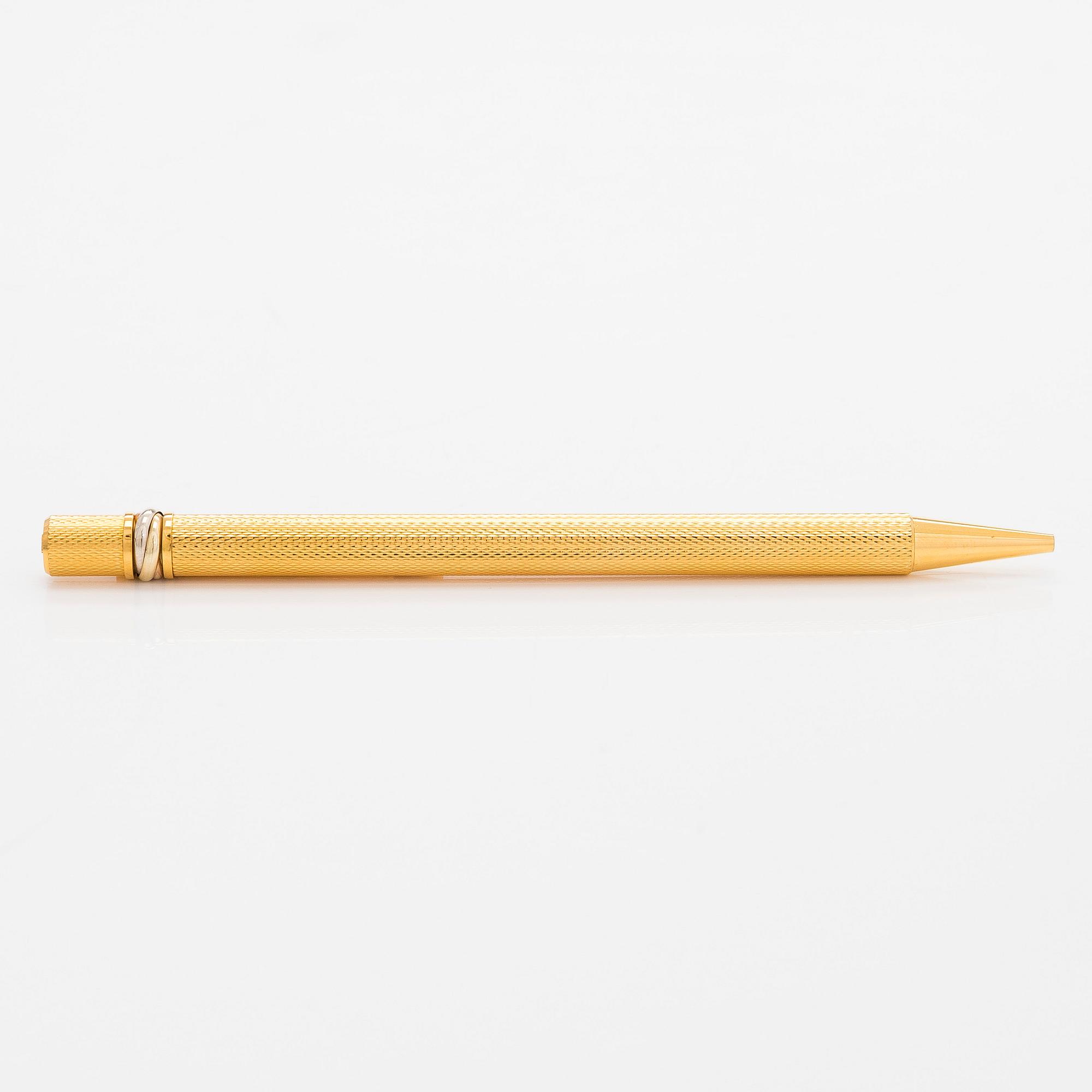 Cartier, must de Cartier, a "Trinity" ballpoint pen.