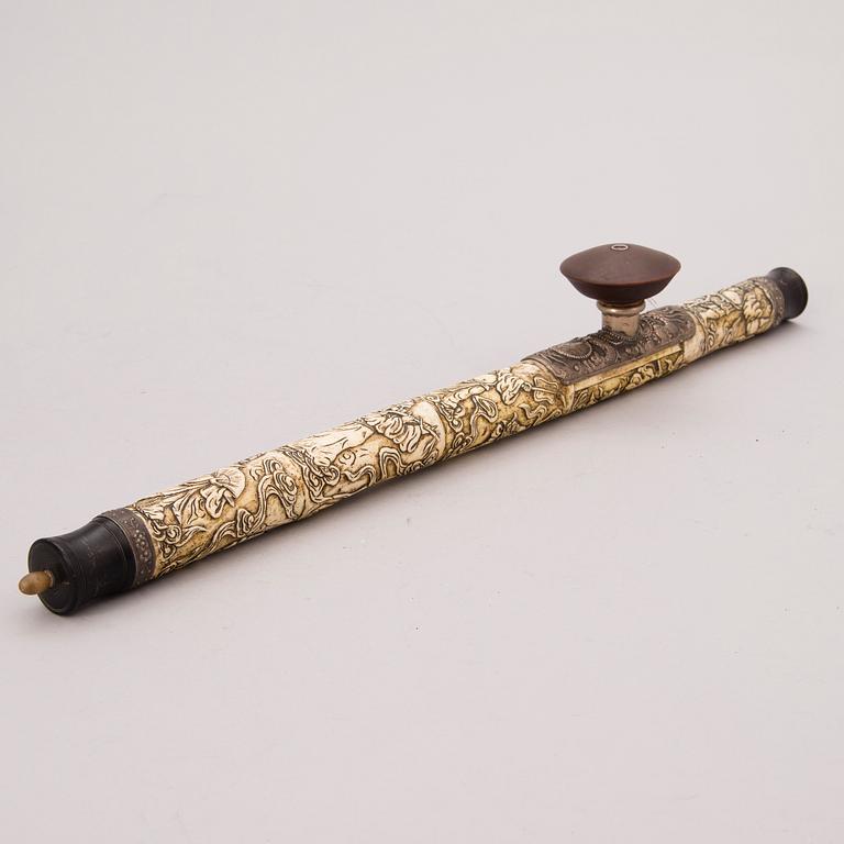 A bone, metal and wood opium pipe, probably China, circa 1900.