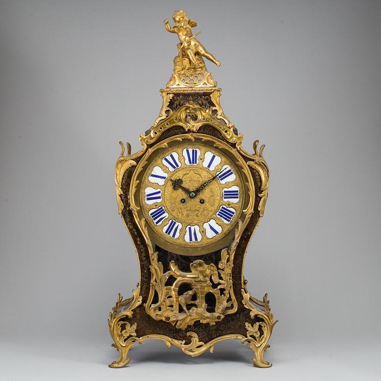 A French Louis XV pendulum clock, signed Lefaucheur fils a Paris.