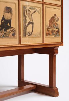 Josef Frank, 'Apskåpet' (The monkey cabinet), a rare cabinet covered with prints of different monkeys, Svenskt Tenn, Sweden ca 1941.