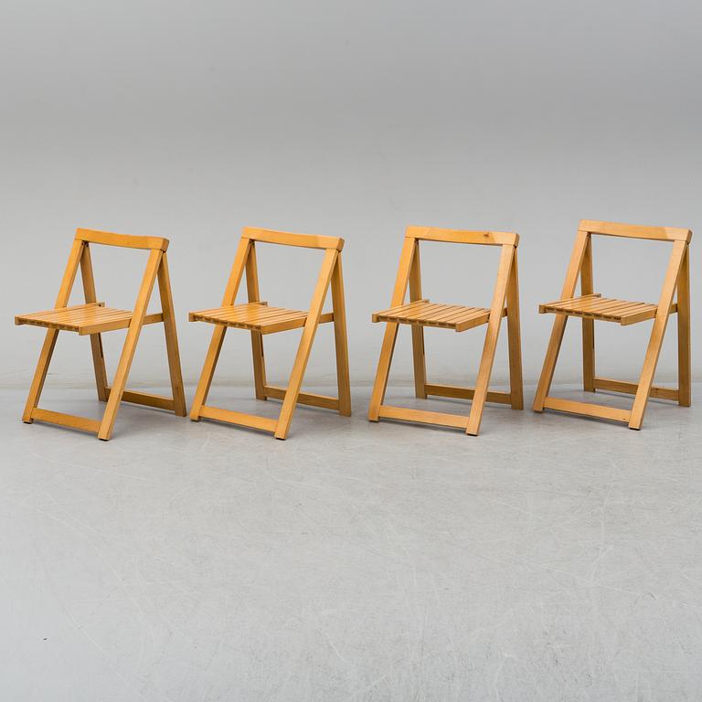 A gateleg table and 4 chairs, late 20th century.