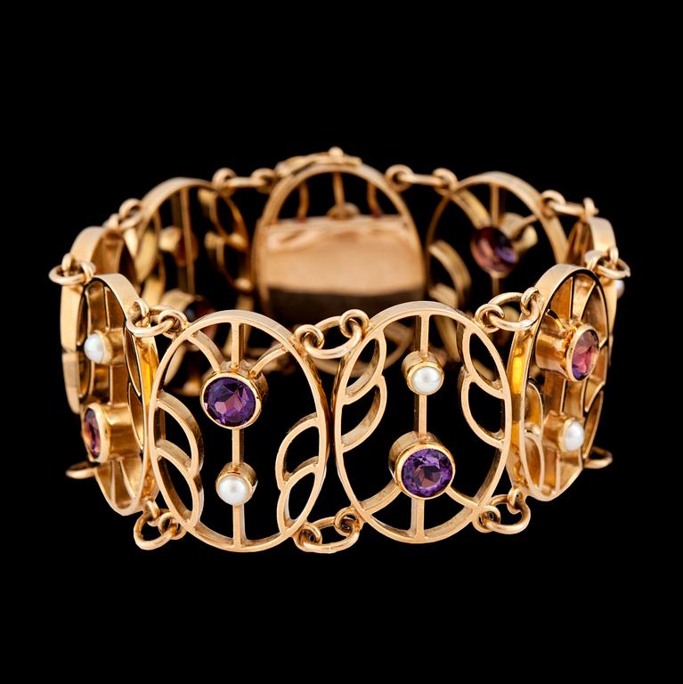 An amethyst and cultured pearl bracelet.