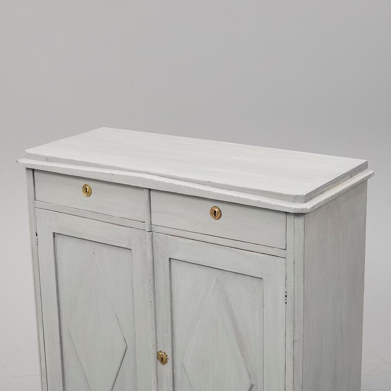 A mid 19th Century painted cupboard.