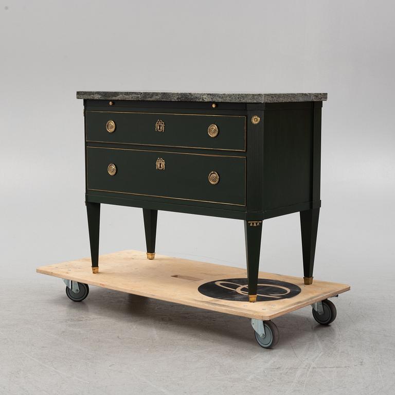 A Gustavian style chest of drawers, early 20th Century.