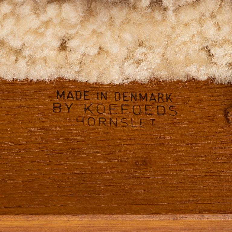 A set of six teak dining chairs upholstered in new sheepskin by Niels Koefoed, Denmark, 1960's.