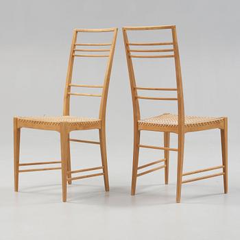 A set of six Erik Chambert 'Poem' birch and rattan dining chairs, Chambert's, Norrköping, Sweden, probably 1950's.