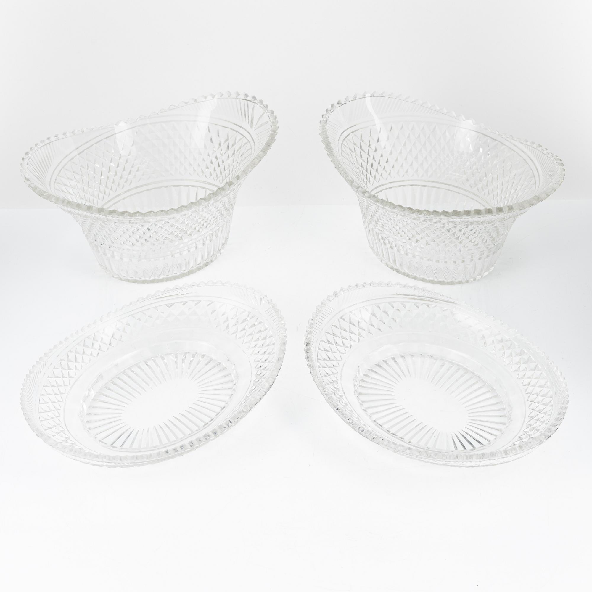 A pair of cut glas jardiieres on stands, 19th Century.