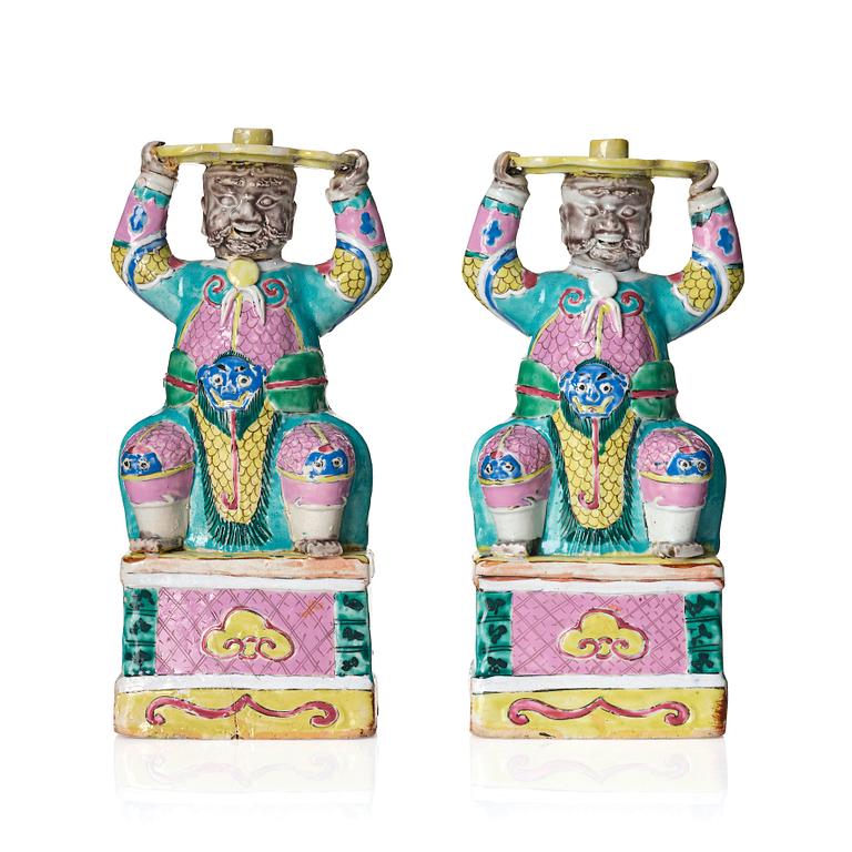 A pair of famille rose candlesticks, Qing dynasty, Qianlong (1736-95).