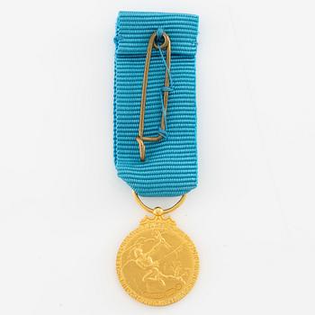 Medal, 14k gold, LM Ericsson, for merit and skill.