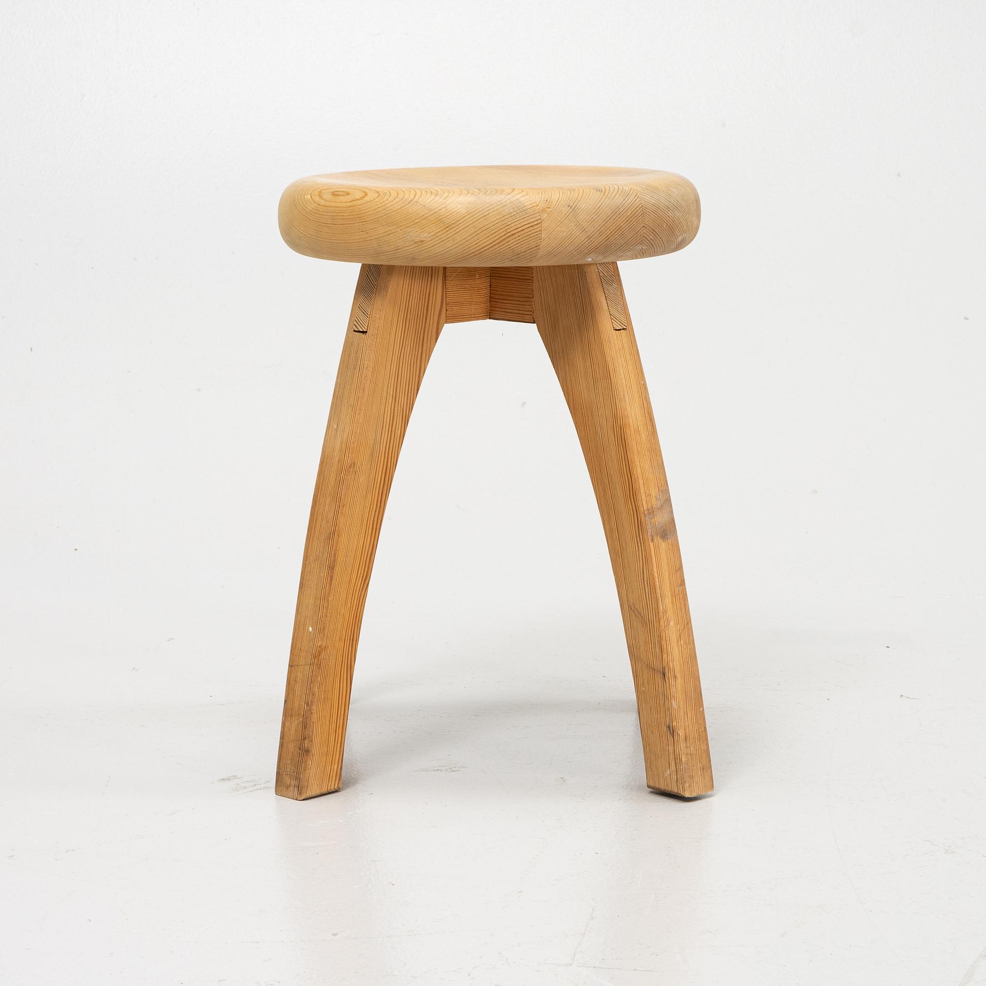 A pine stool, second half of the 20th Century.