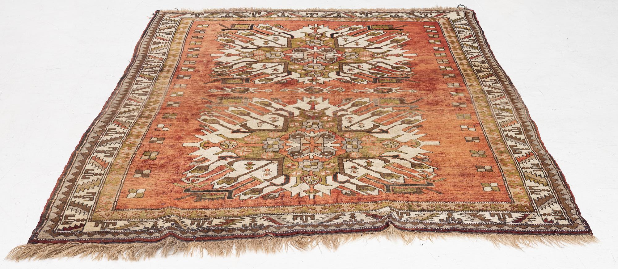 A Chelaberd rug of , 'Eagle Kazak' design, South Caucasus, c.  234 x 164 cm.