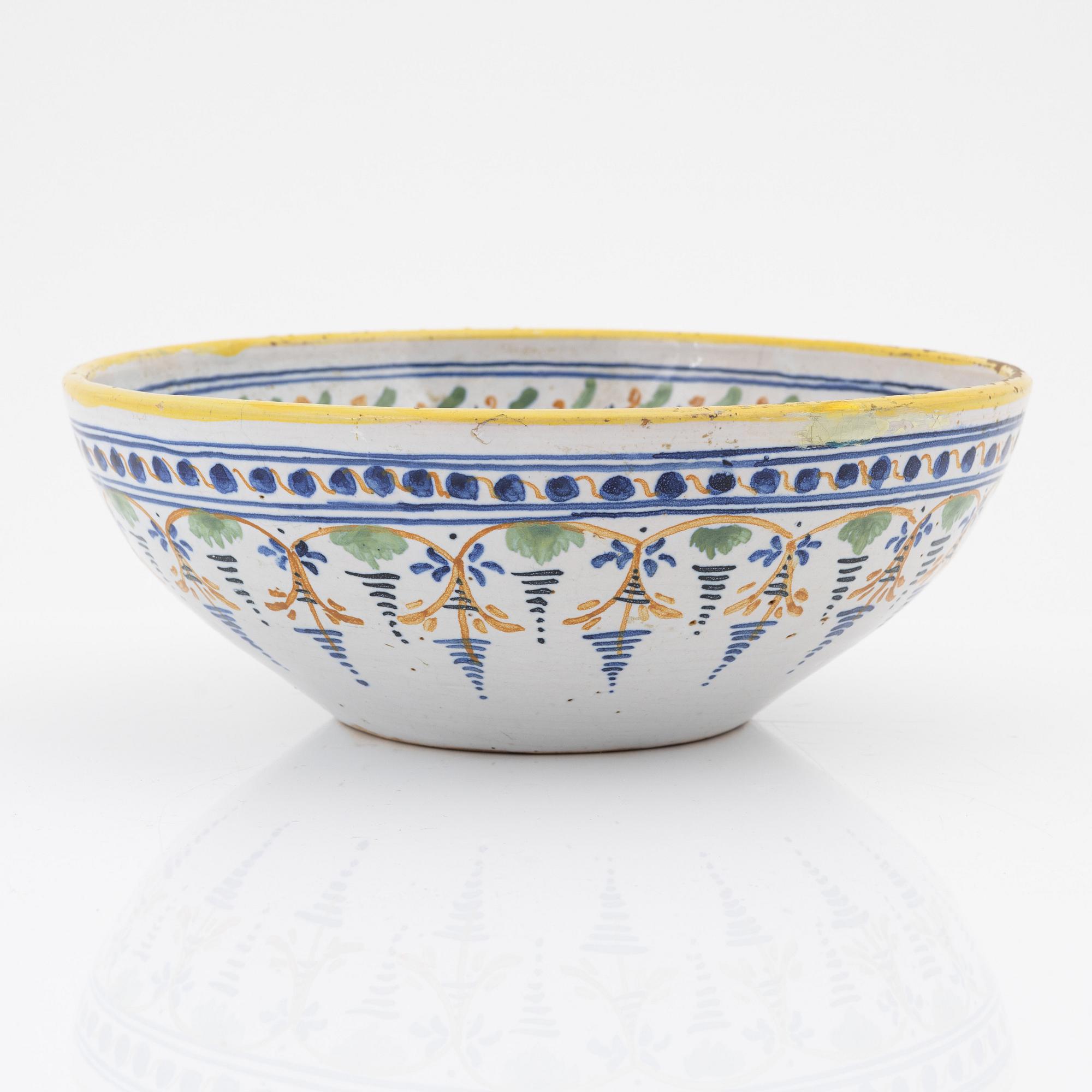 A faience bowl, 18th Century.