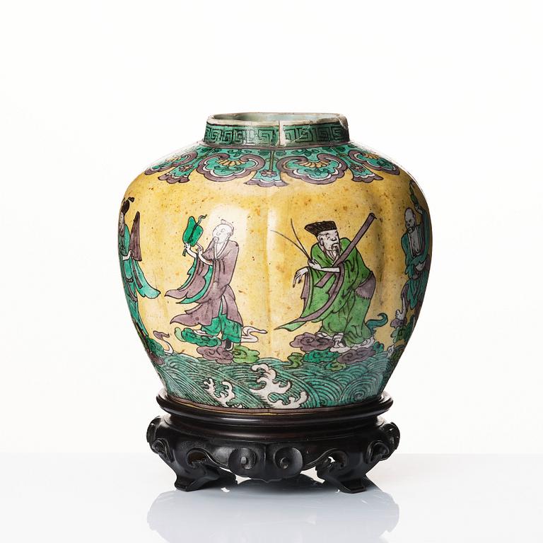 A melon shaped jar decorated with the eight immortals, 17th Century.