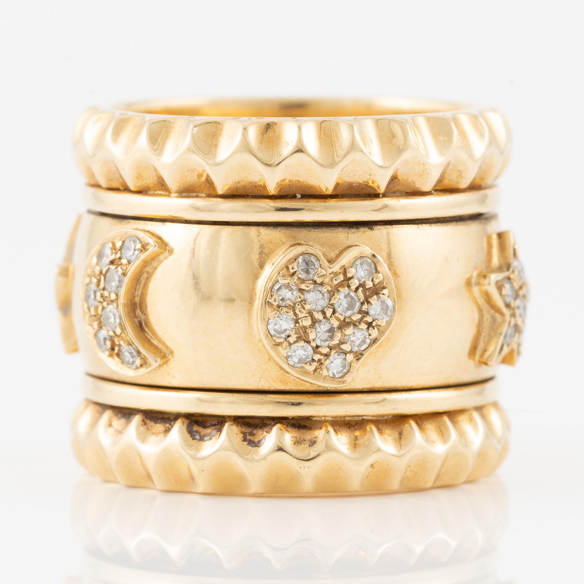 Ring in 18K gold with eight-cut diamonds, decorated with stars, hearts, and moons.