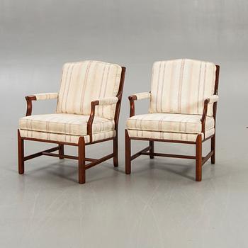 A pair of Ellinor armchairs from Bröderna Andersson later part of the 20th century.