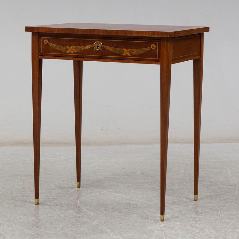 A gustavian style sewing table, early 20th century.