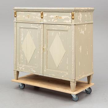 A circa 1800 late Gustavian cupboard.