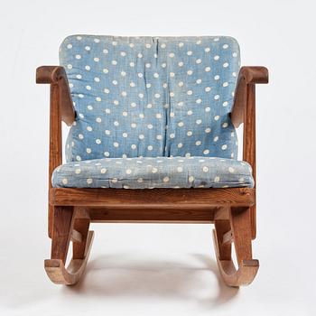 "Sportstugemöbel", a stained pine rocking chair, Nordiska Kompaniet Sweden 1930-40's.