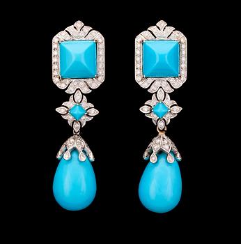 1059. A pair of turqouise and brilliant cut diamond earrings, tot. app. 1.70 cts.