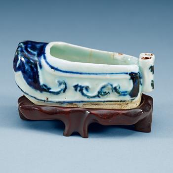 1764. A shoe shaped blue and white brush pot, Ming dynasty, Tianqi (1621-27).