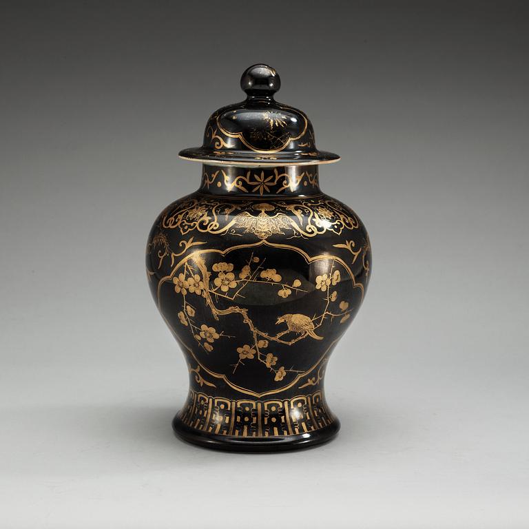 A black glazed jar with cover, Qing dynasty, 19th Century with Kangxi's six character mark.
