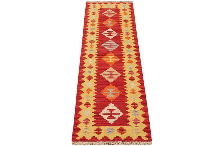 A Kilim runner carpet, c. 197 x 60 cm.