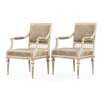 A pair of Gustavian late 18th century armchairs by Johan Lindgren, master 1770.