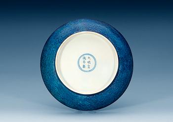 A 'peacock turquoise glazed' dragon dish, Ming dynasty, with Xuande´s six character mark and of the period (1425-1435).