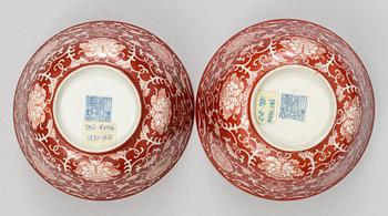 Two reserved-decorated coral-ground bowls, Qing dynasty with Daoguang´s seal mark and of the period (1821-50).