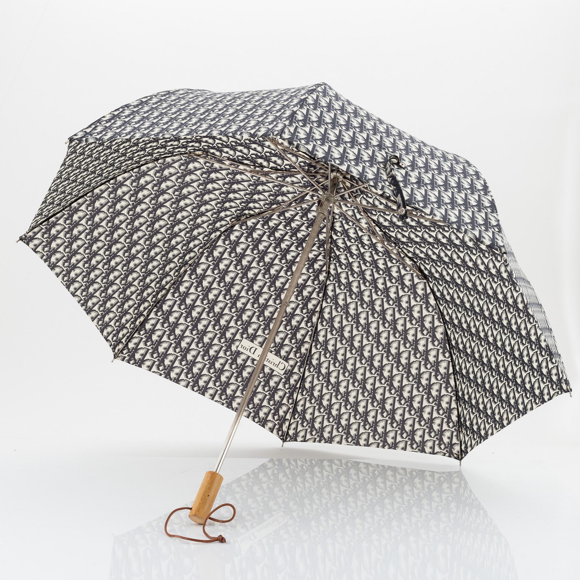 Christian Dior, weekendväska med paraply.