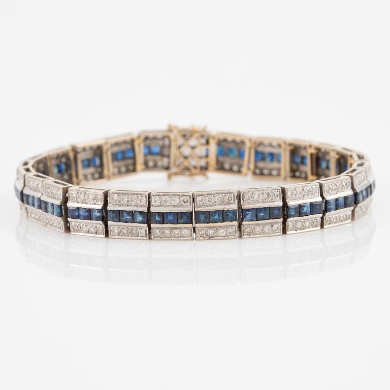 Bracelet 18K gold with round brilliant-cut diamonds and step-cut sapphires.