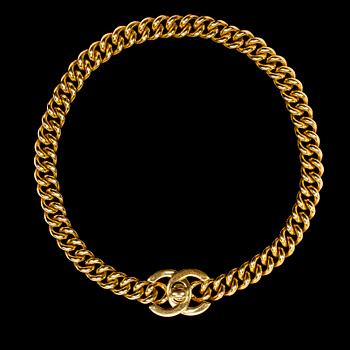 1202. A golden necklace by Chanel from spring 1997.