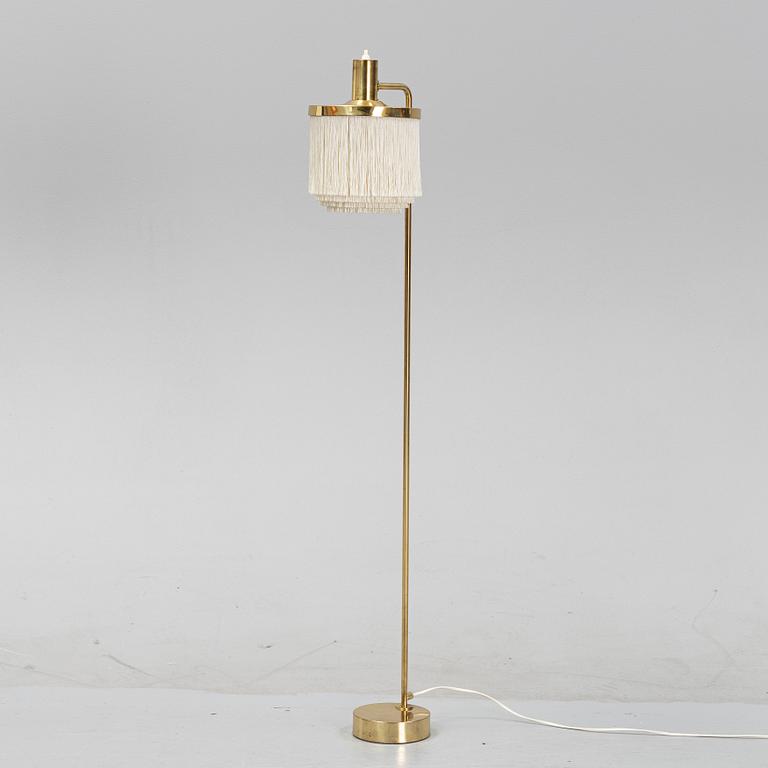 Hans-Agne Jakobsson, a 'G-109' brass floor lamp from Markaryd.