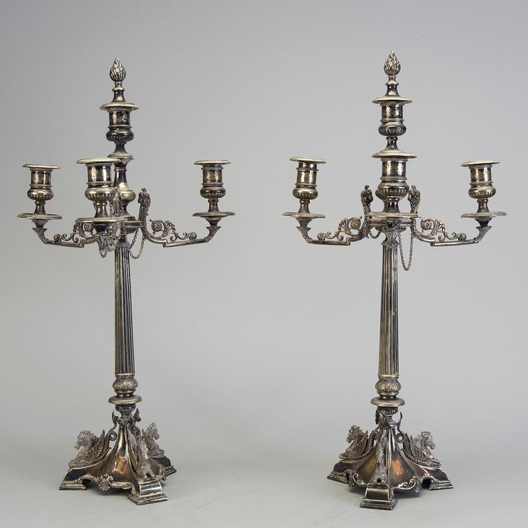 A pair of late 19th century silver plated kandelabras by Henry Wilkinson & Co Ltd, Sheffield, England.