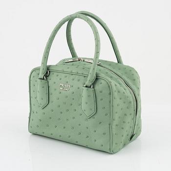 Prada, a green ostrich leather bag.