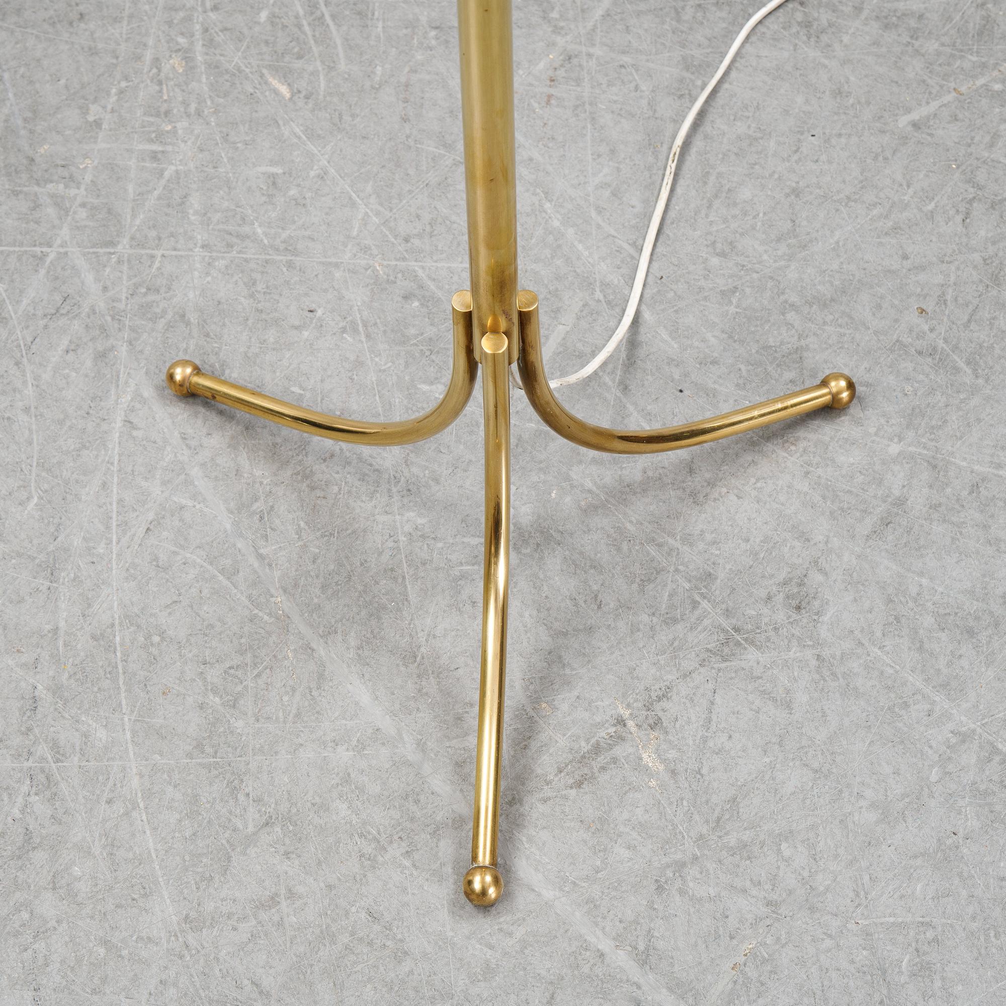 Josef Frank, a model 2326 brass floor light, Firma Svenskt Tenn.