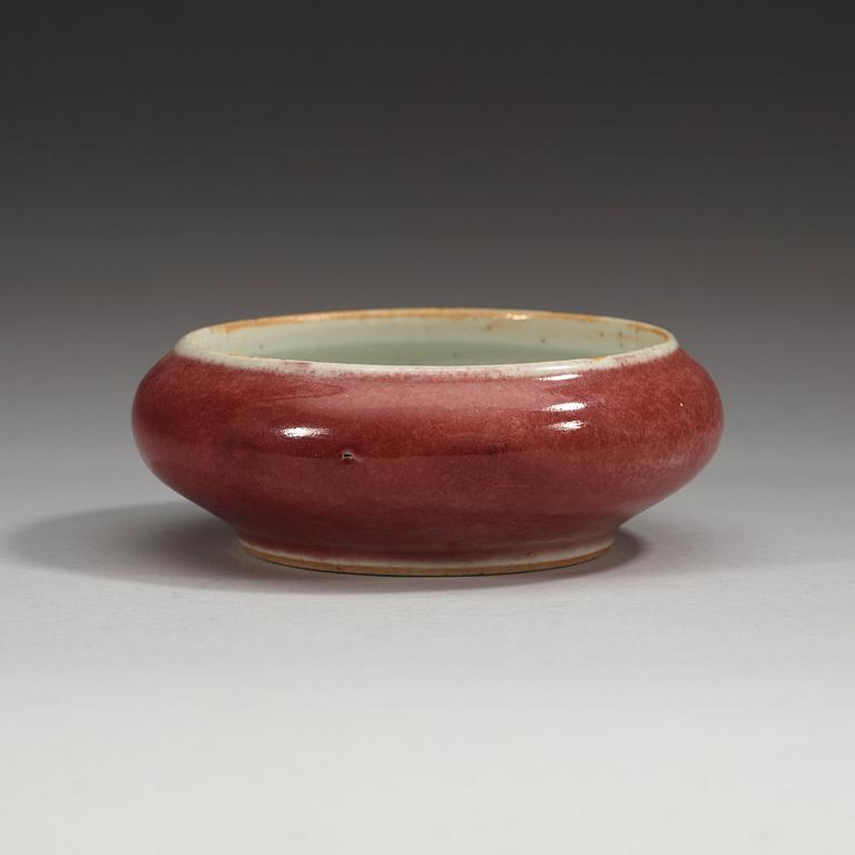 A sang de boef glazed brush washer, late Qing dynasty (1644-1912), with Kangxi six character mark.