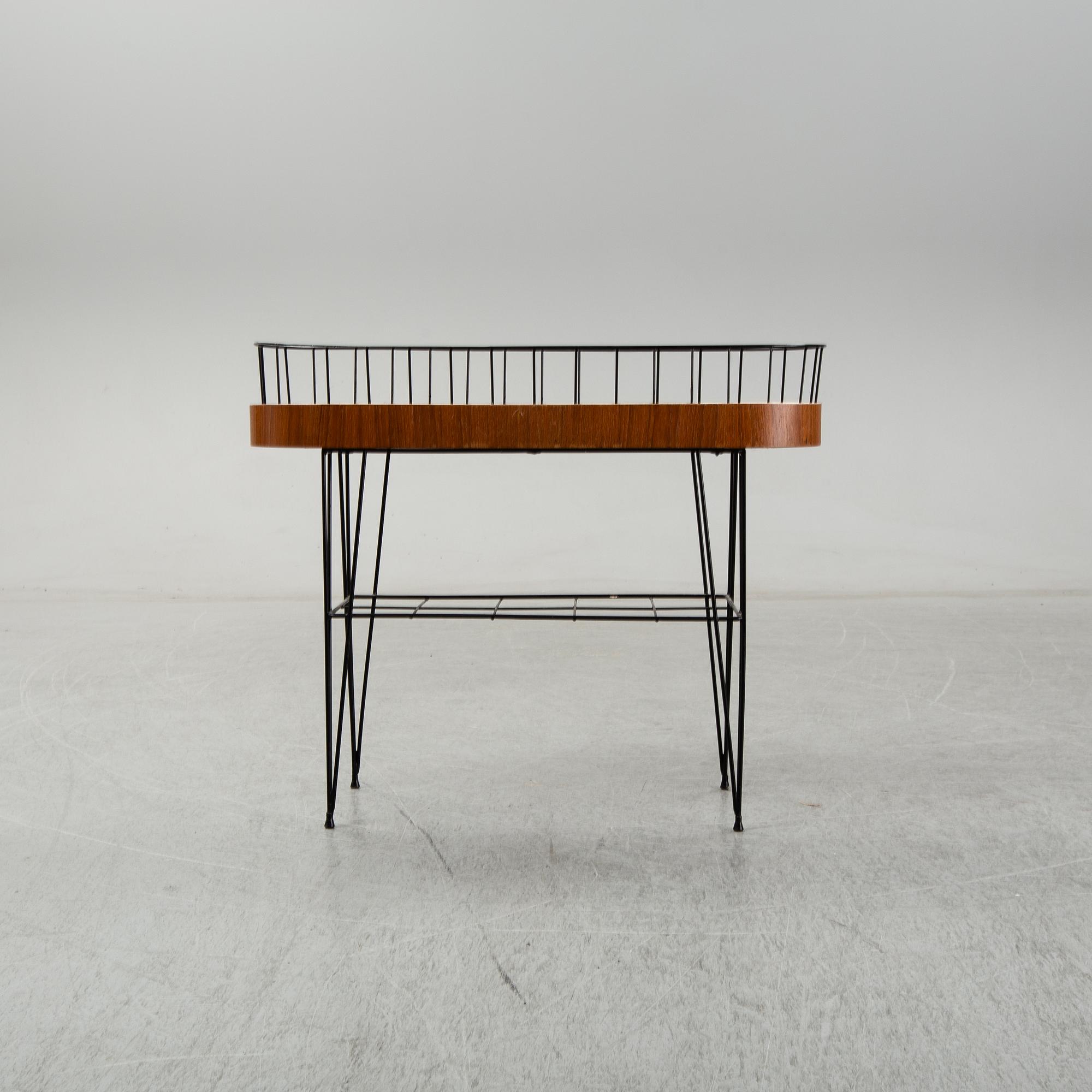 A 1950-60s plant stand.