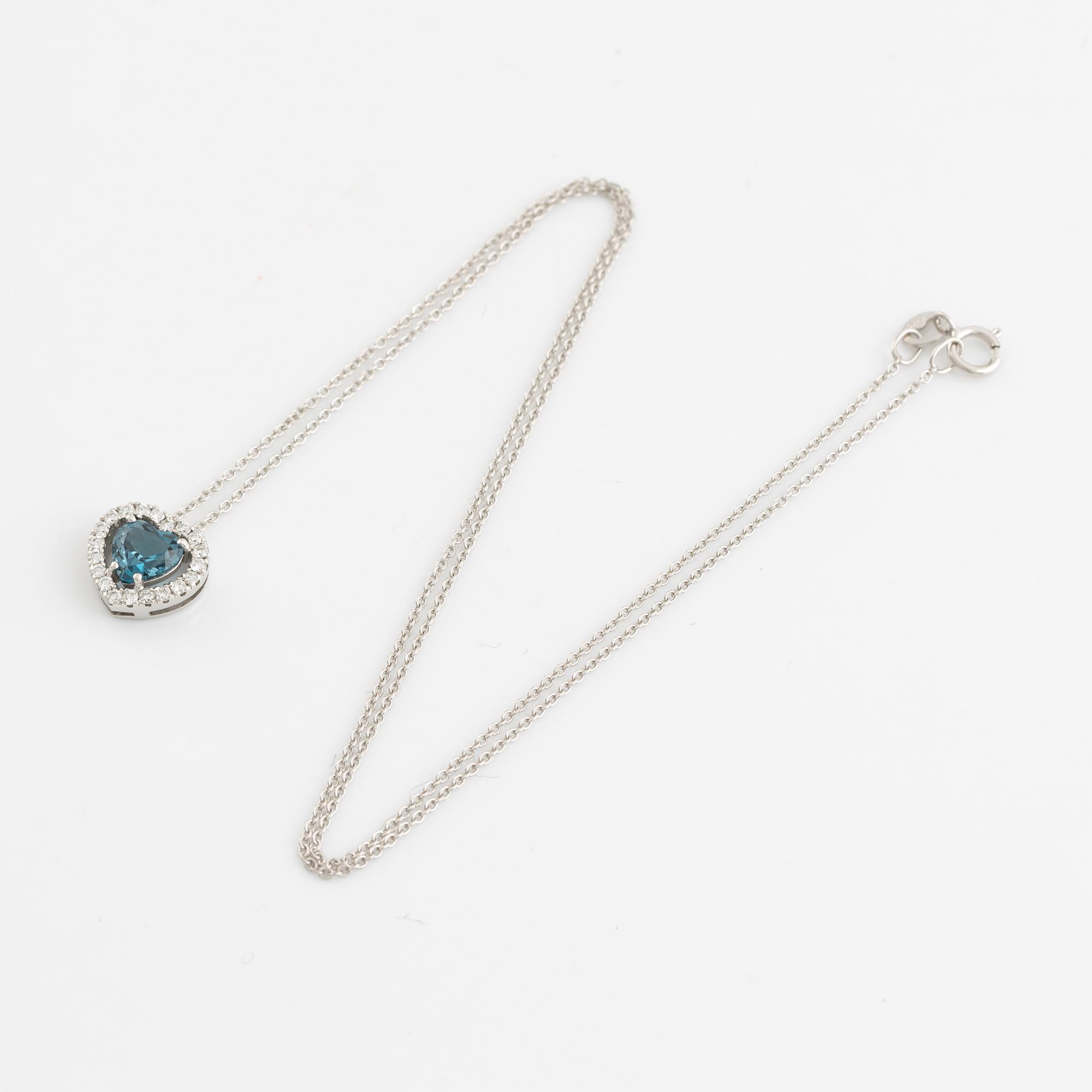 Collier med hjärtformad blå topas och briljantslipade diamanter.