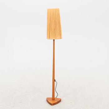 A 1940/50s teak floor lamp.