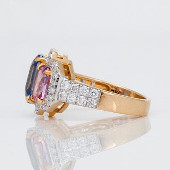 A 5.87 ct blue, pink and yellow sapphire and 0.76ct diamond ring.